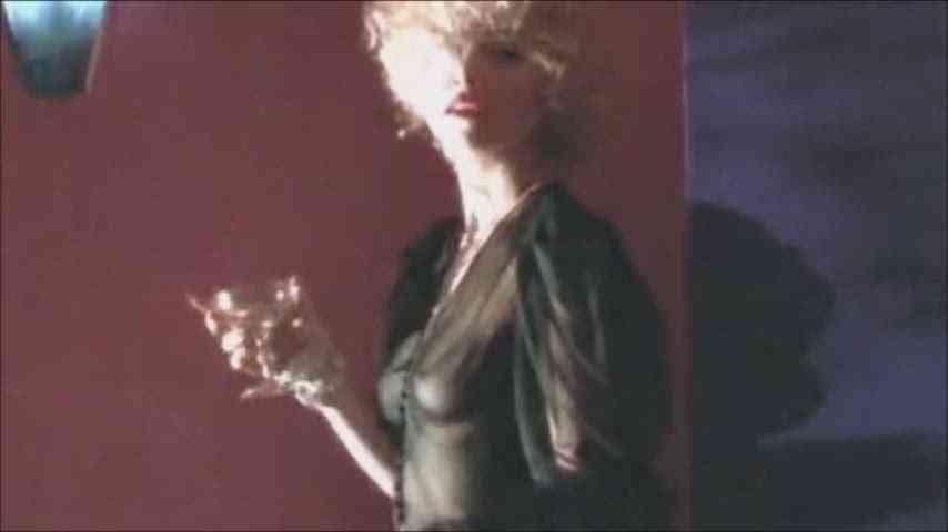 Madonna's very see-through robe in the PG rated movie "Dick Tracy (1990)"