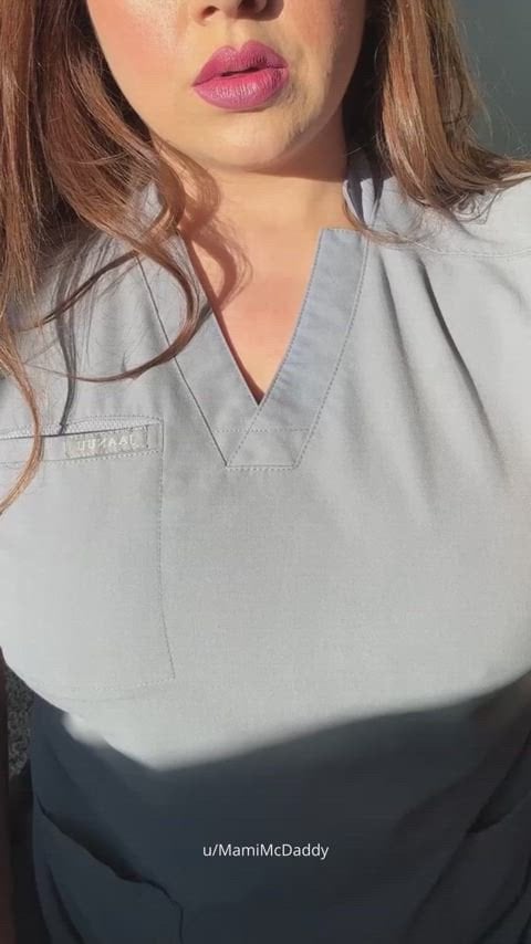 My 35 yr old mom tits hiding behind my scrubs