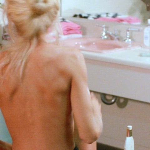 Dona Speir in “Guns” (1990) Nude Sex Video Scene